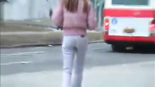 Girl takes a huge shit in white pants and stands around in public