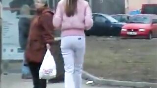Girl takes a huge shit in white pants and stands around in public