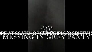 Messy girl wipes her gray panty on a metal bar