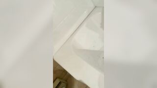 Woman takes a big shit in the bathtub