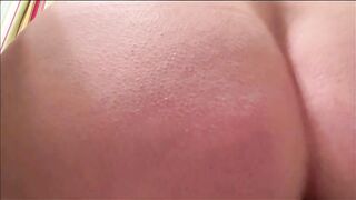 Woman pushes out a huge shit, closeup on asshole