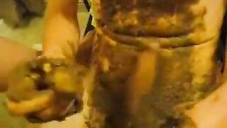 Girl takes a shit on her hands in the bathroom