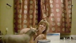 Nude woman eats shit from a bowl