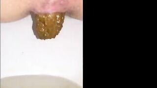Woman drops long nasty shit into toilet
