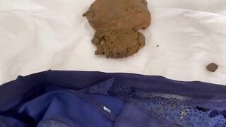 Sophia shits in her panty and takes a huge dump