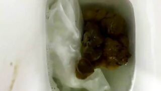 Woman pushes a big shit out of her ass