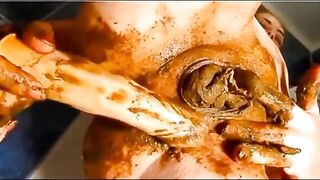 Woman finger fucks her ass full of shit