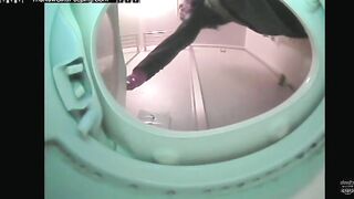 Girl in black dress takes a shit in a public restroom