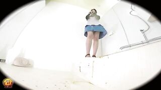 Girl in short skirt squats on toilet and takes a huge dump