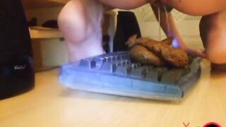 Woman takes huge shit on a keyboard