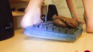 Woman takes huge shit on a keyboard