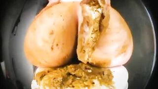 Woman uses her ass to play with shit on a plate