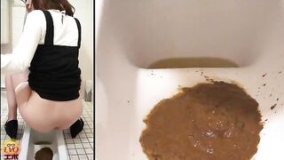 Woman takes a huge shit in a toilet while wearing a harness