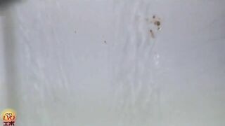 Girl in school uniform drops a smelly load in toilet
