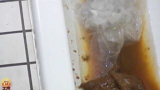 Woman with leopard print shirt shits in the toilet