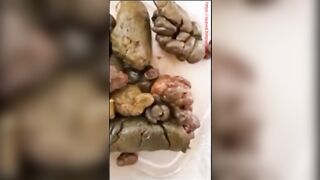 Girl takes a huge shit in a plastic bin