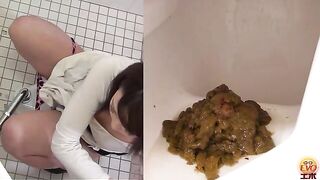 Woman takes a huge shit on the toilet in the bathroom