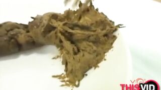 A big log of shit on a white plate ready to be eaten