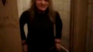 Woman plays with her shit in the toilet