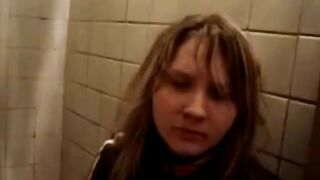 Woman plays with her shit in the toilet