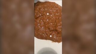Girl in gray panties takes a massive shit on a sink