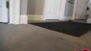 Woman shits on the carpet in the hallway