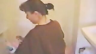 Woman takes a dump in a bathtub