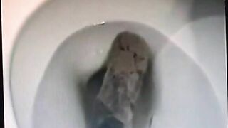 Brunette milf shits a big one