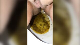 Hairy girl takes a huge shit on the toilet