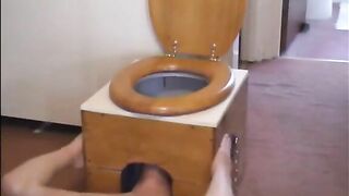 Babe squats on homemade wooden toilet and shits