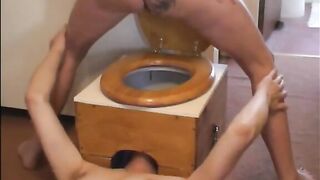 Babe squats on homemade wooden toilet and shits