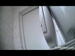 Sexy girl peeing over the toilet
