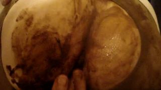 Fingering her tight asshole hard with poop