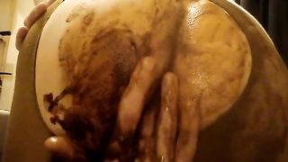 Fingering her tight asshole hard with poop