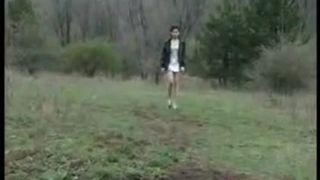 Petite brunette decided to poop in a forest