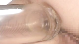 Shooting enema through her tight ass