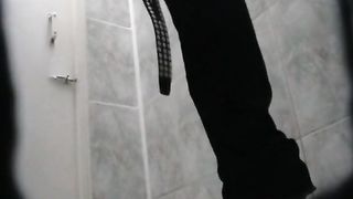 Russian girl using a public bathroom
