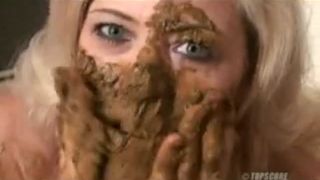 Mature woman smearing crap on her entire body