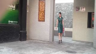 Chinese girl using a public bathroom