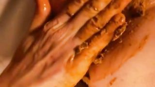 Handjob with fresh poop on her hands