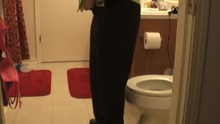 Brunette mature woman cleaning her ass