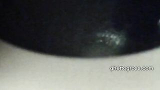 Black woman pooping in a lunch box