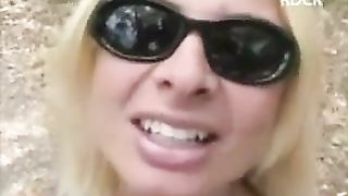 Blonde MILF dropped a big turd outdoor