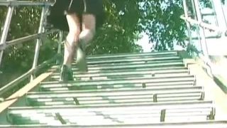 Mature secretary peeing outside her work place