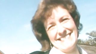 Mature secretary peeing outside her work place