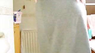 Hot babe shitting in grey skirt and panties