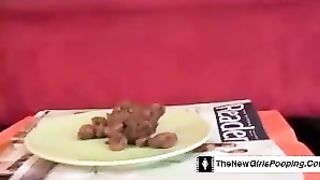 Ebony teen laughing as she's constipated