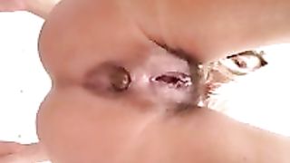 Hot babe shitting on top of a camera