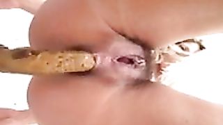 Hot babe shitting on top of a camera