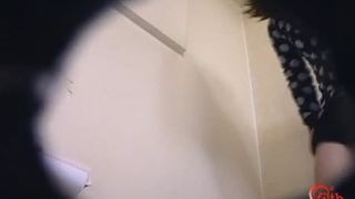 Amateur brown haired Japanese using a public bathroom